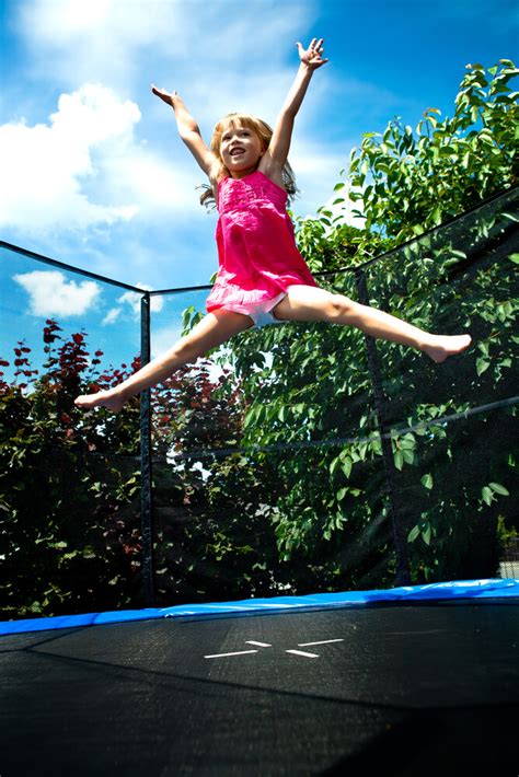 She slipped and tumbled every time she tried jumping on the ice covered trampoline. . Videos of girls jumping on trampolines